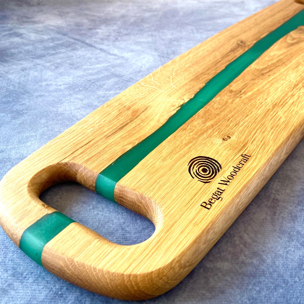 Oak charcuterie board with green resin