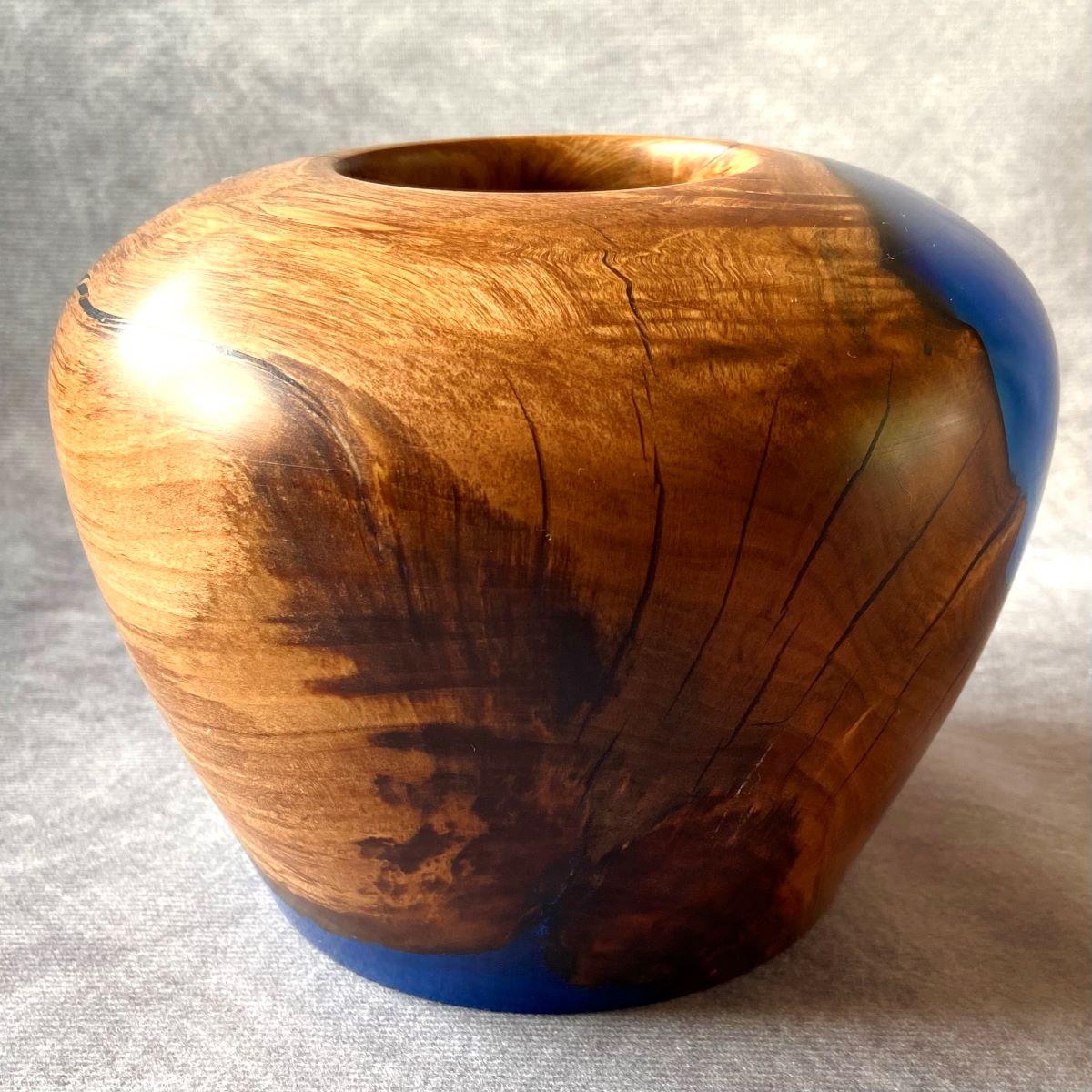 English apple wood and cobalt blue hollow form top view