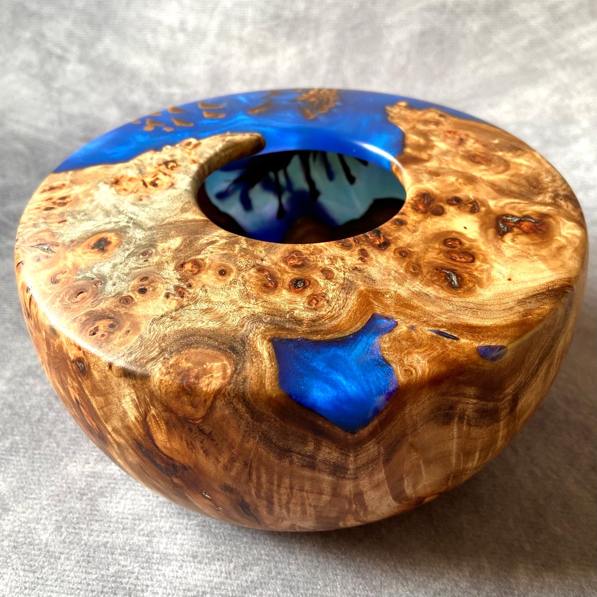 Cobalt blue and mappa burr hollow form top front view