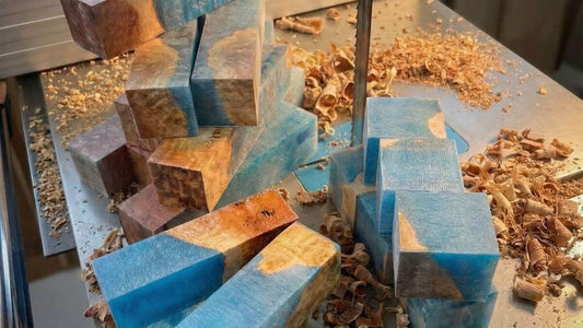 Slicing a large stabilised burr wood and resin master block on a bandsaw to show bubble-free internal structure handmade in UK