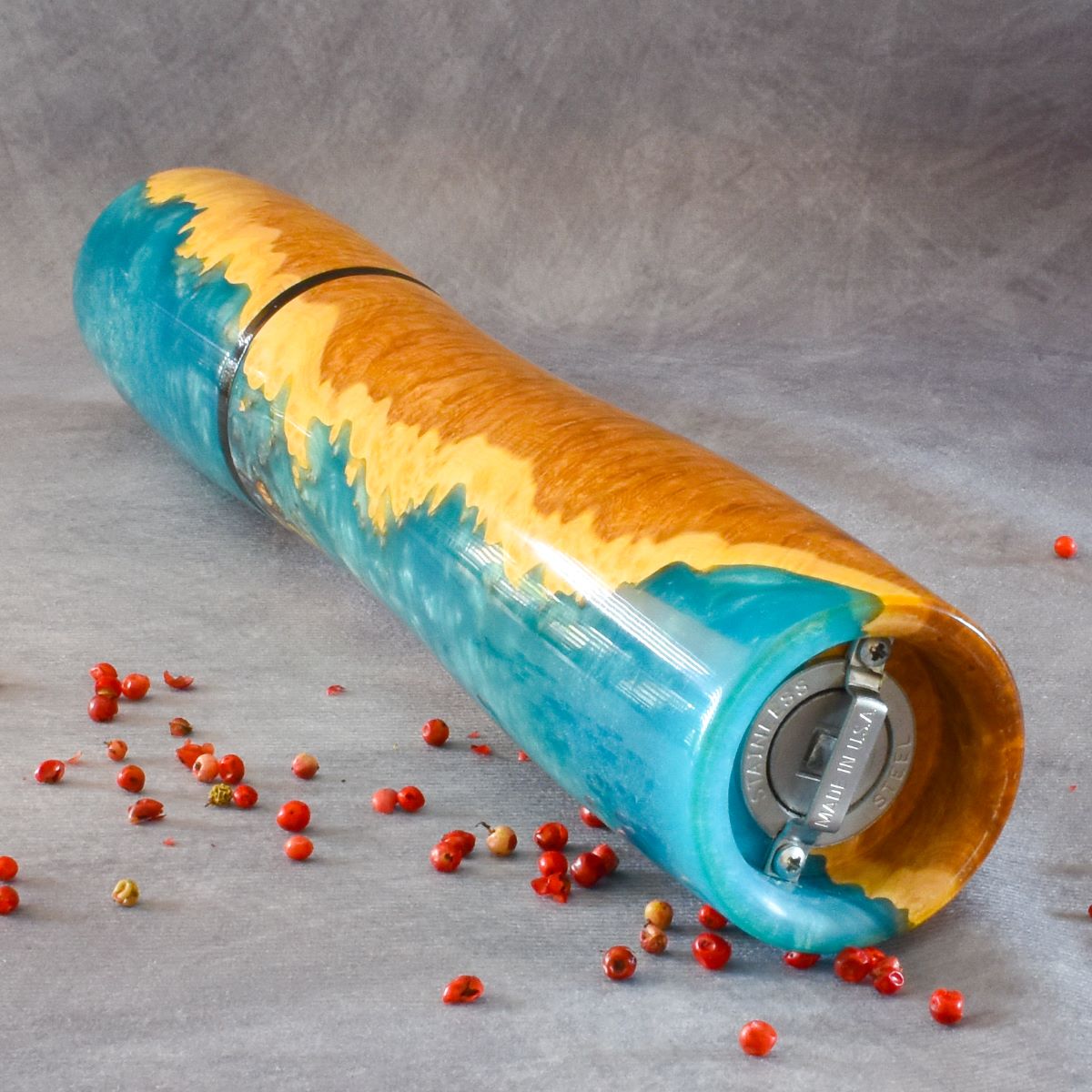 Mallee burr and turquoise resin pepper mill bottom view showing grinding mechanism