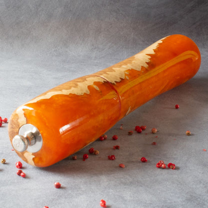 Mallee burr and orange resin pepper mill top view showing adjustment knob