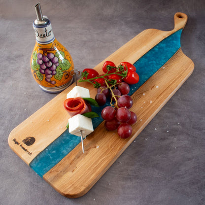 Charcuterie board with produce in English oak and turquoise resin viewed from above