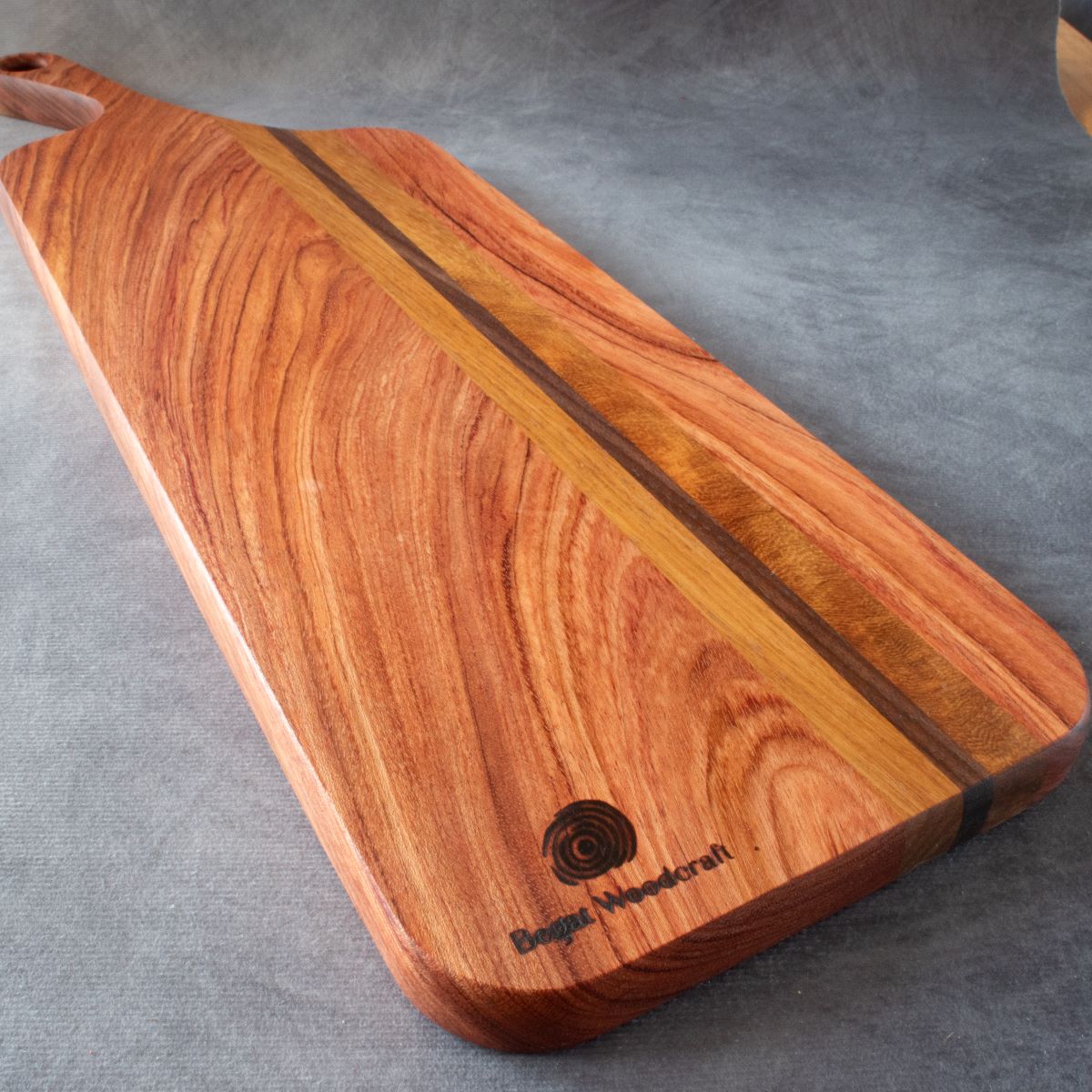 Charcuterie board in African Rosewood & Kiaat viewed from bottom edge