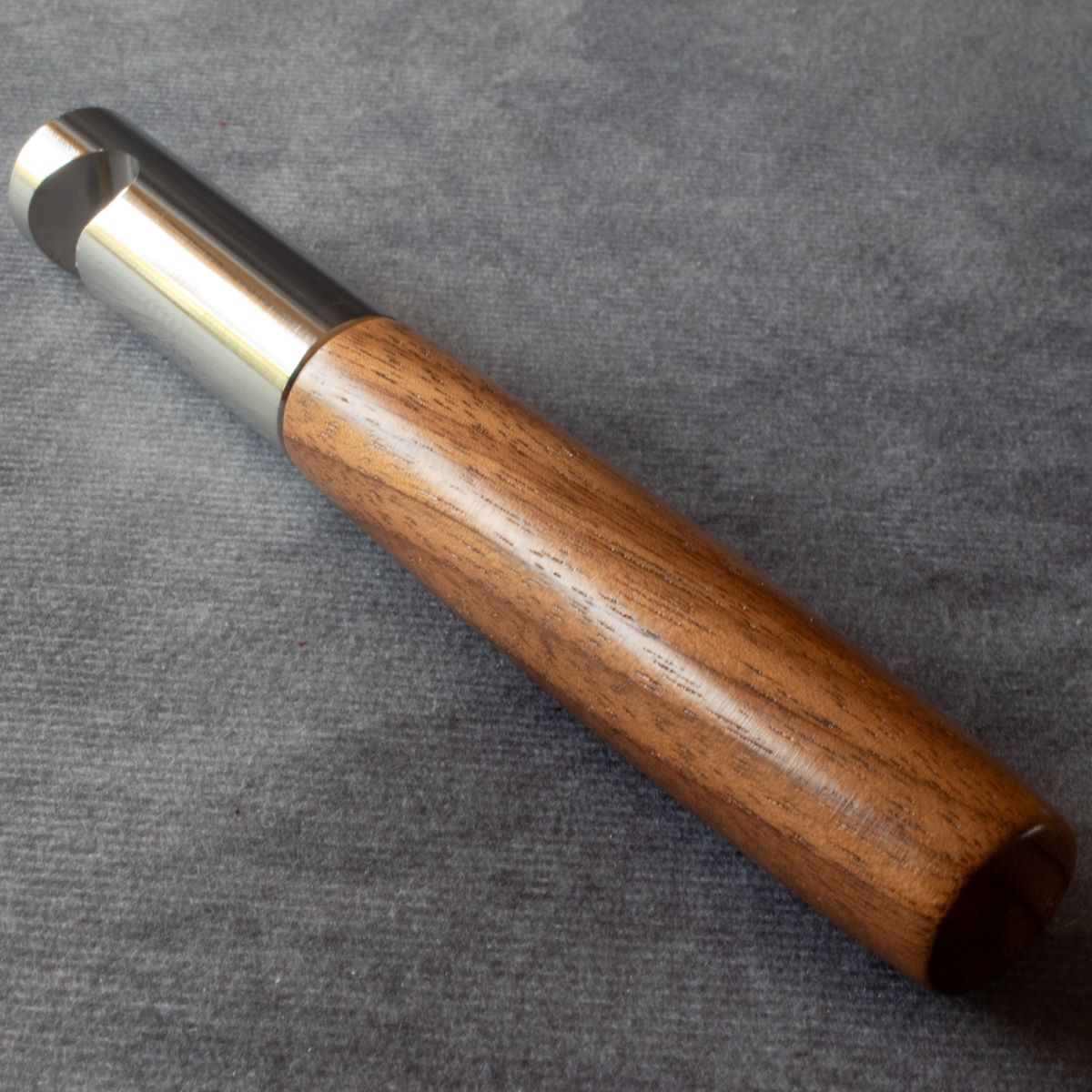 Stainless steel bottle opener with walnut handle