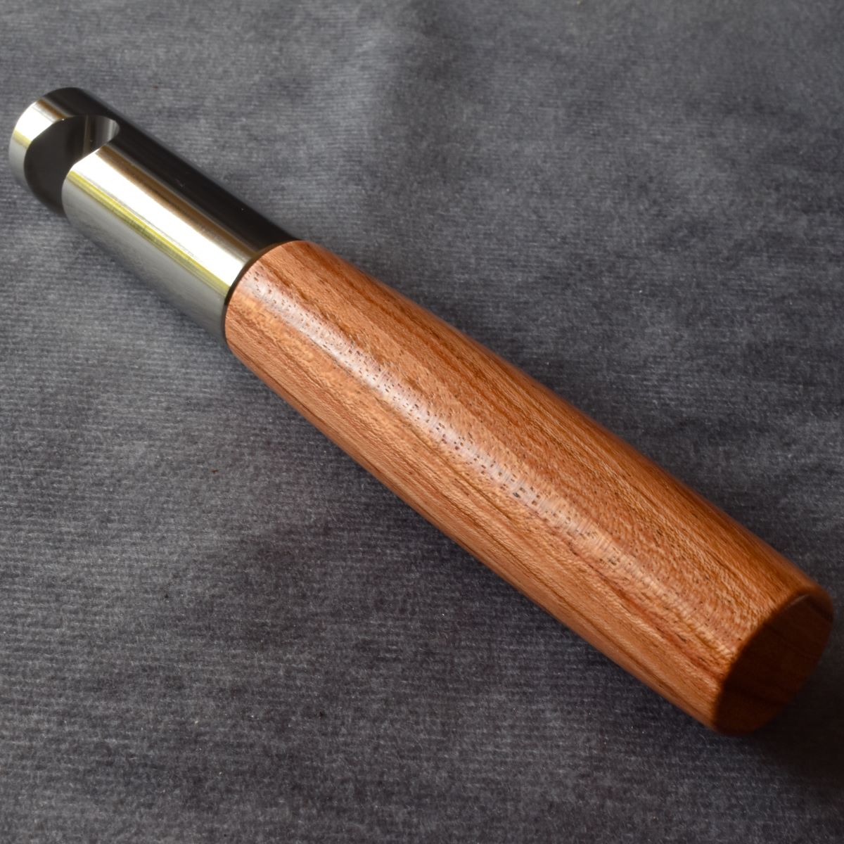 Stainless steel bottle opener with African rosewood handle