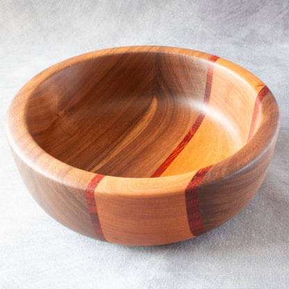 Wooden salad bowl in walnut padauk and cherry top view