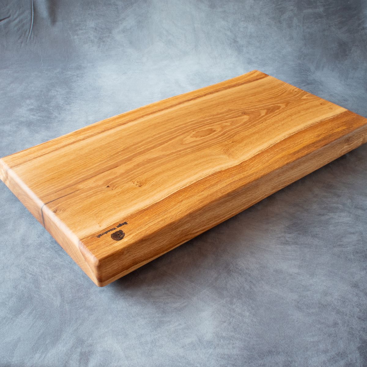 English oak live edge cutting board rear edge view