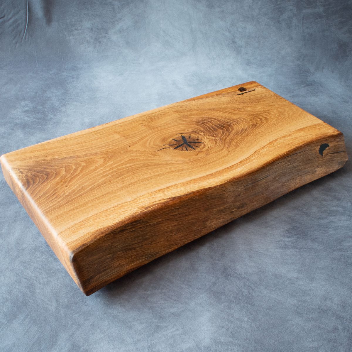 English oak live edge cutting board front edge view