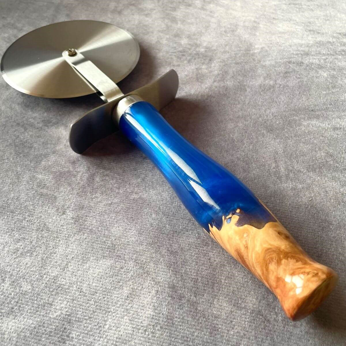 handmade blue resin and burr wood pizza cutter artisan gifts uk