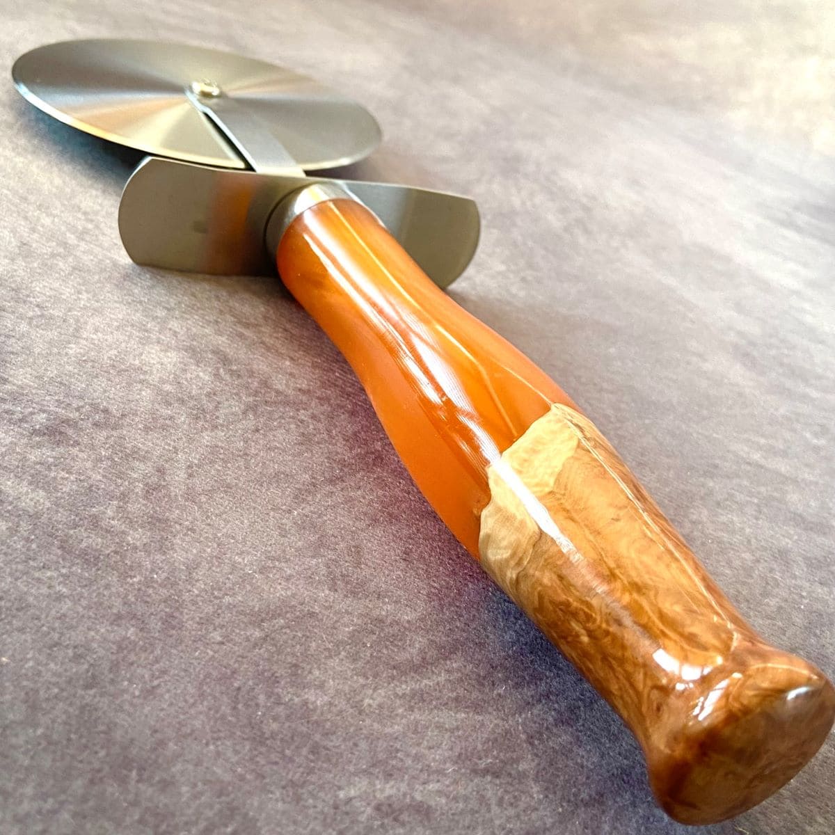 handmade orange resin and burr wood pizza cutter artisan gifts uk