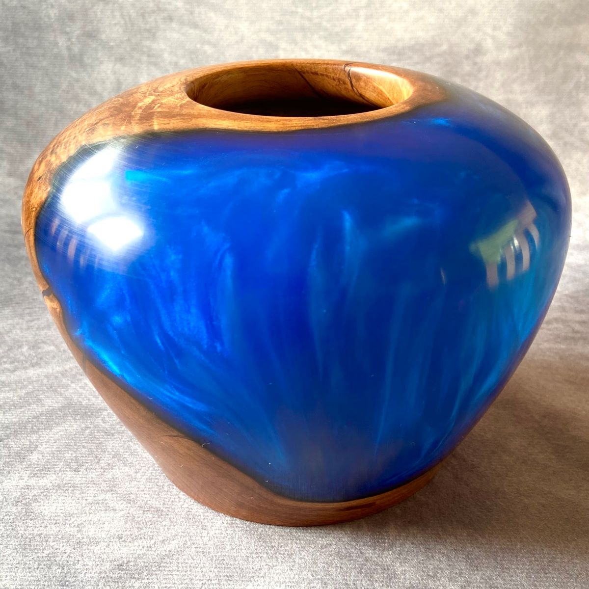 English apple wood and cobalt blue hollow form rear view