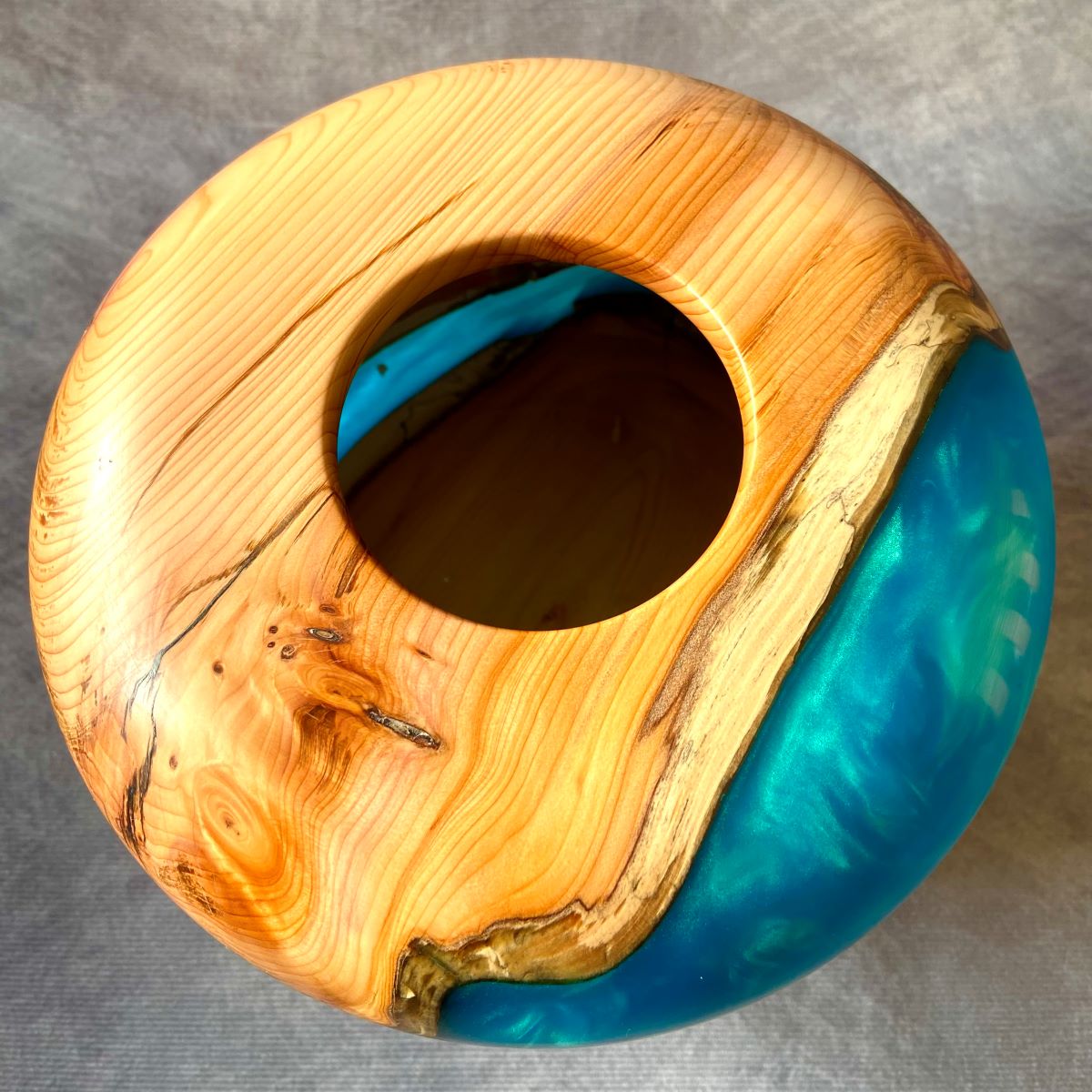 English yew and turquoise resin hollow form top view