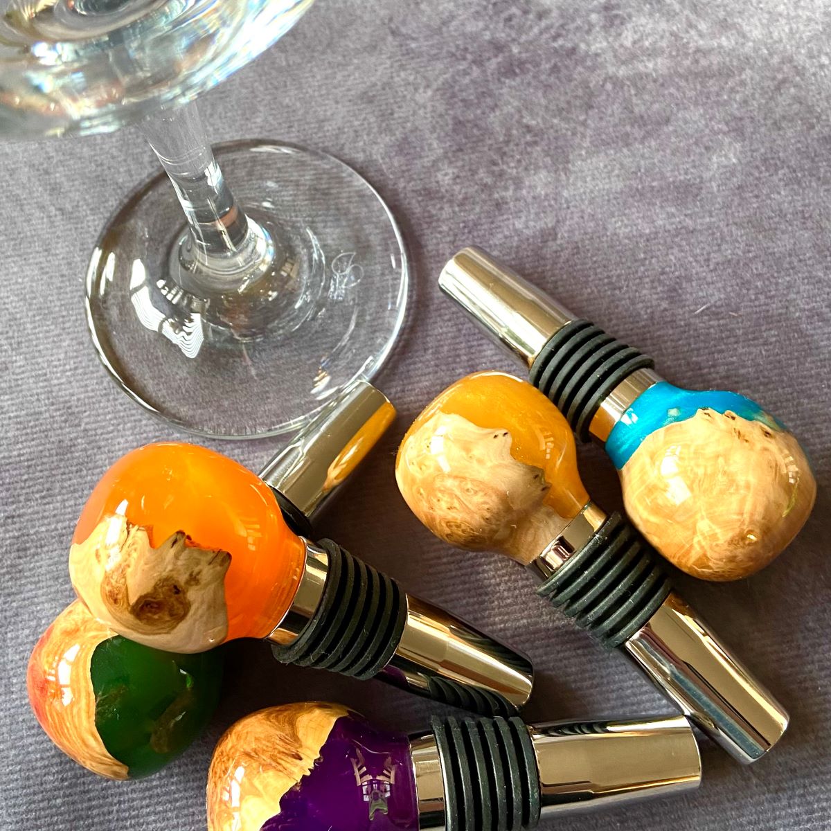 Group view of mallee burr and resin wine stoppers