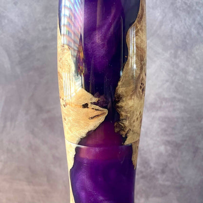 Close up detail of clustered grain and high-gloss finish on Mappa Burr and purple resin pepper mill.