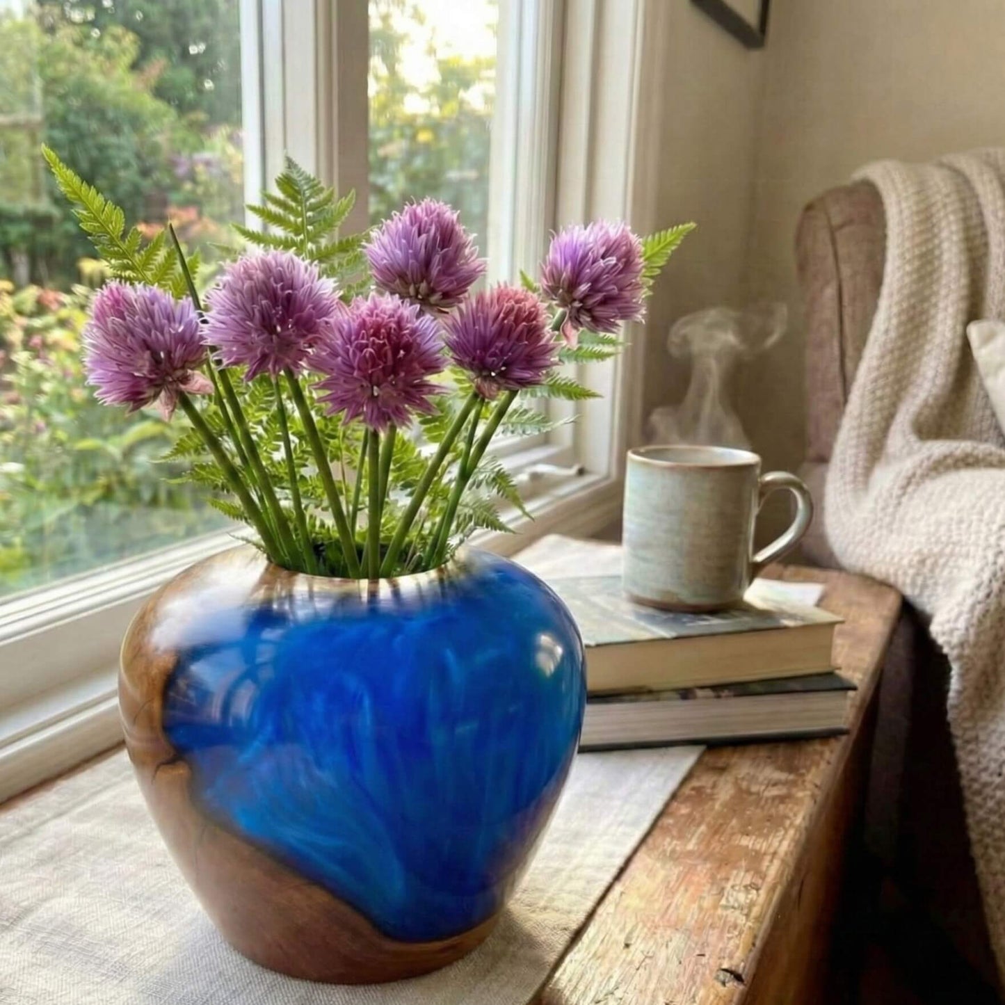 Modern blue and wood sculpture displayed as statement home decor centrepiece