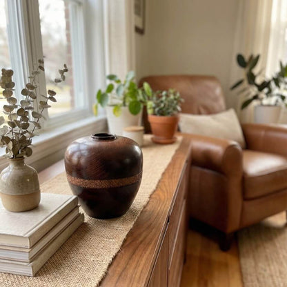 English Oak Hollow Form displayed on mantelpiece with dried flowers