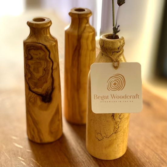 Front view of 3 different bud vases