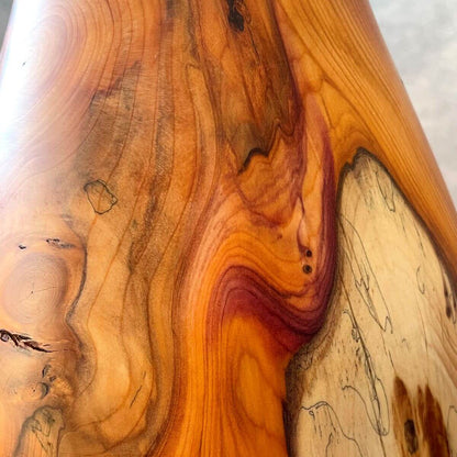 Close up of natural voids and fractures in an English Yew decorative vessel. Authentic handmade wooden art  crafted in the UK.