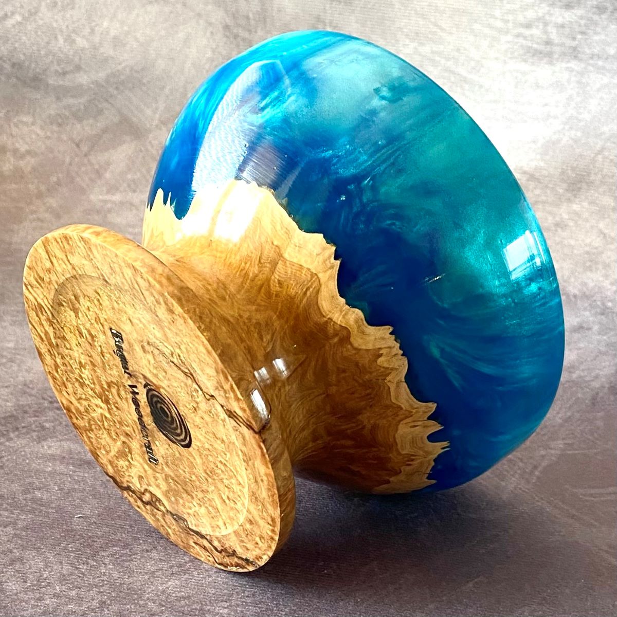 Bottom view of mallee and turquoise footed bowl