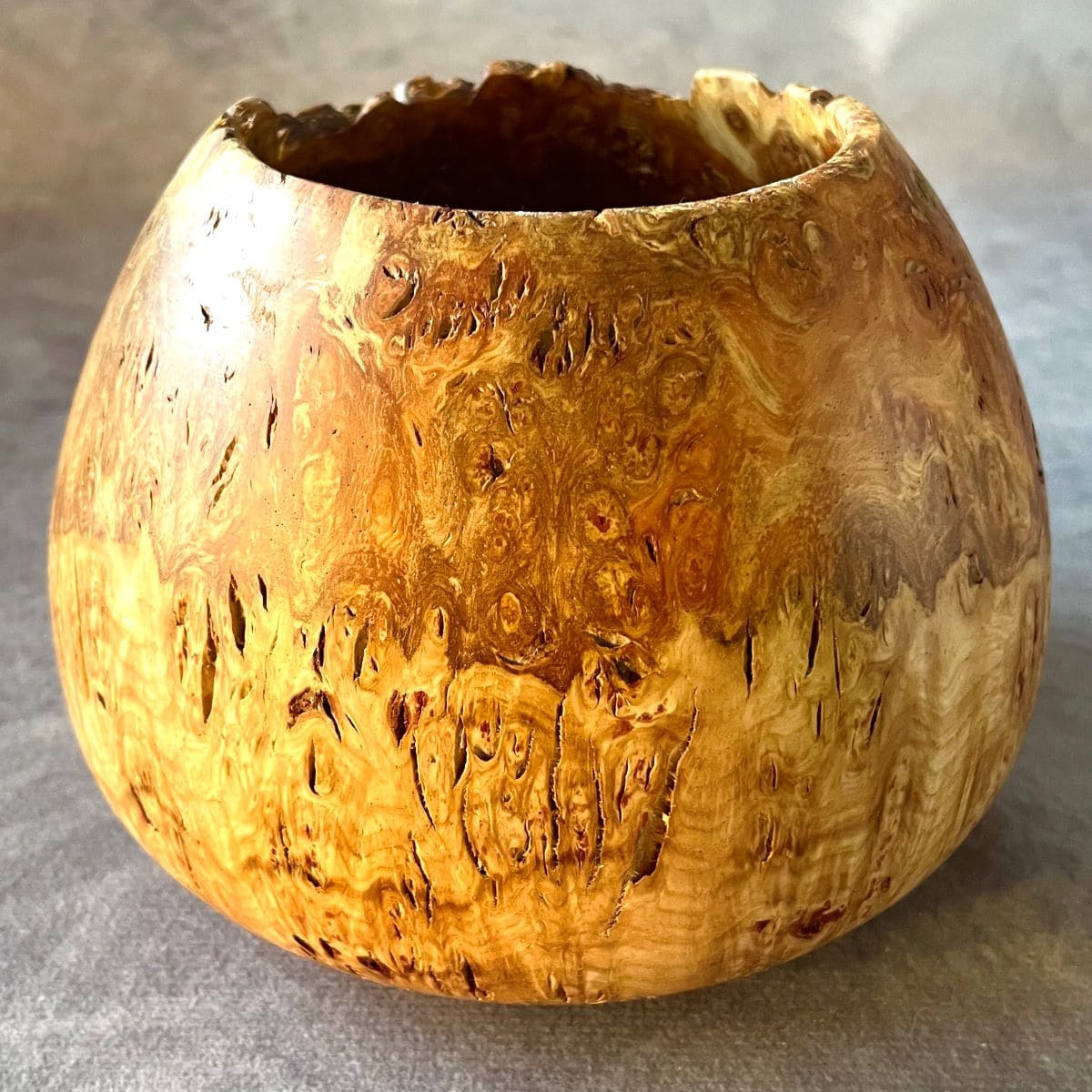 Handmade mappa burr enclosed vessel rear view wooden art sculpture