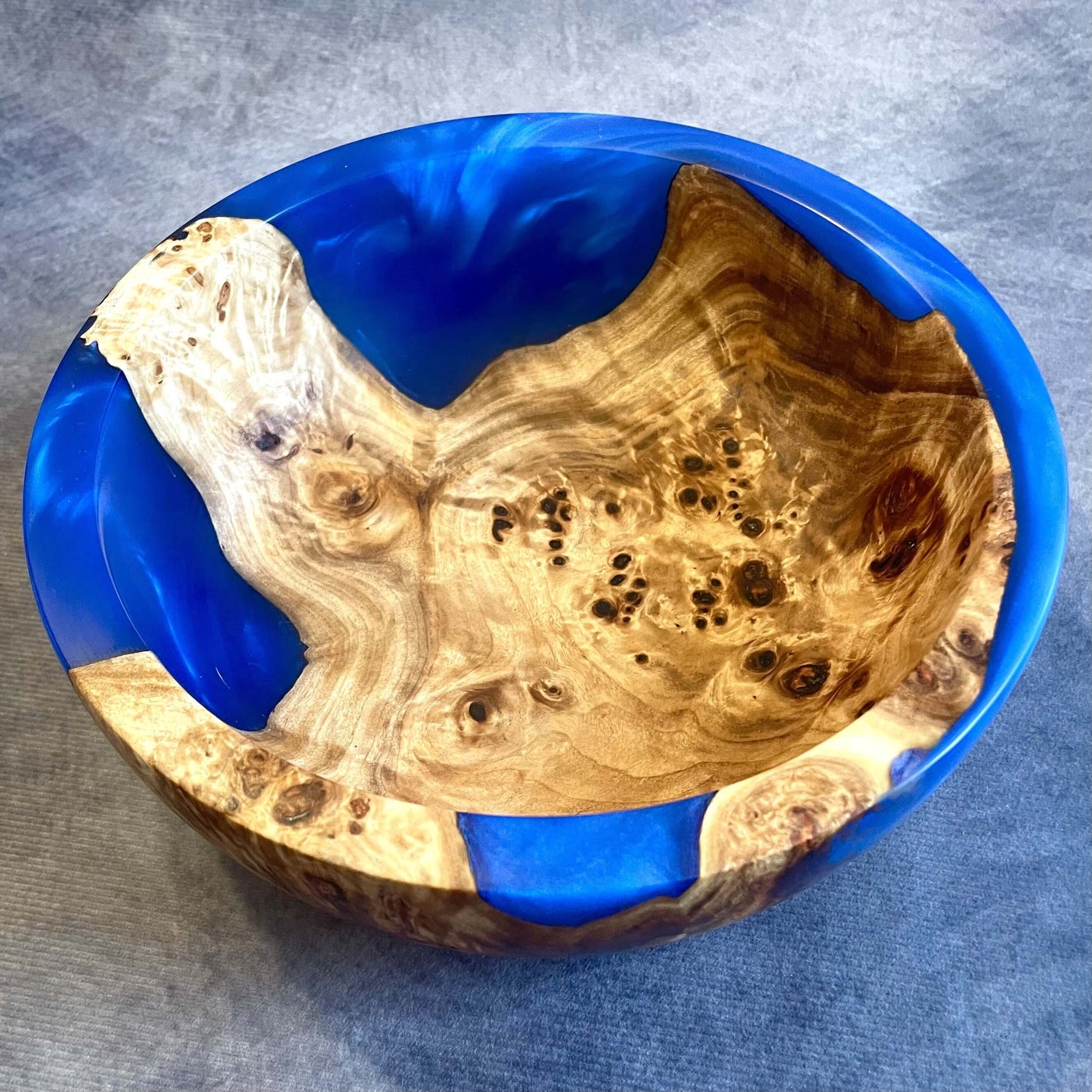 top view of Mappa Burr and Cobalt Blue Resin Bowl showing rim thickness and curve.