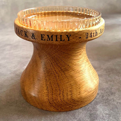 Close up detail of deep laser etched names and dates on solid oak, perfect for a 5th wedding anniversary gift.