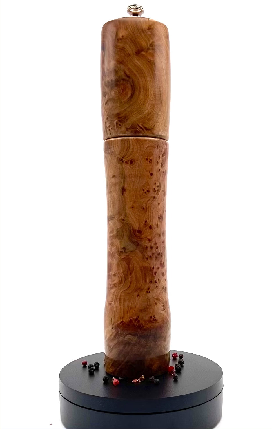 Video of thuya burr pepper mill rotating on turntable