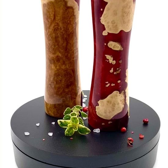 Video of mallee burr & red resin salt & pepper shaker set on rotating turntable