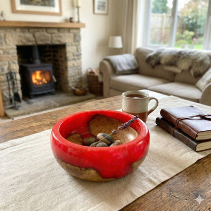 Large red and wood bowl displayed as modern coffee table centrepiece