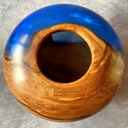 Detail of small opening on Apple Wood hollow form showing cobalt resin depth
