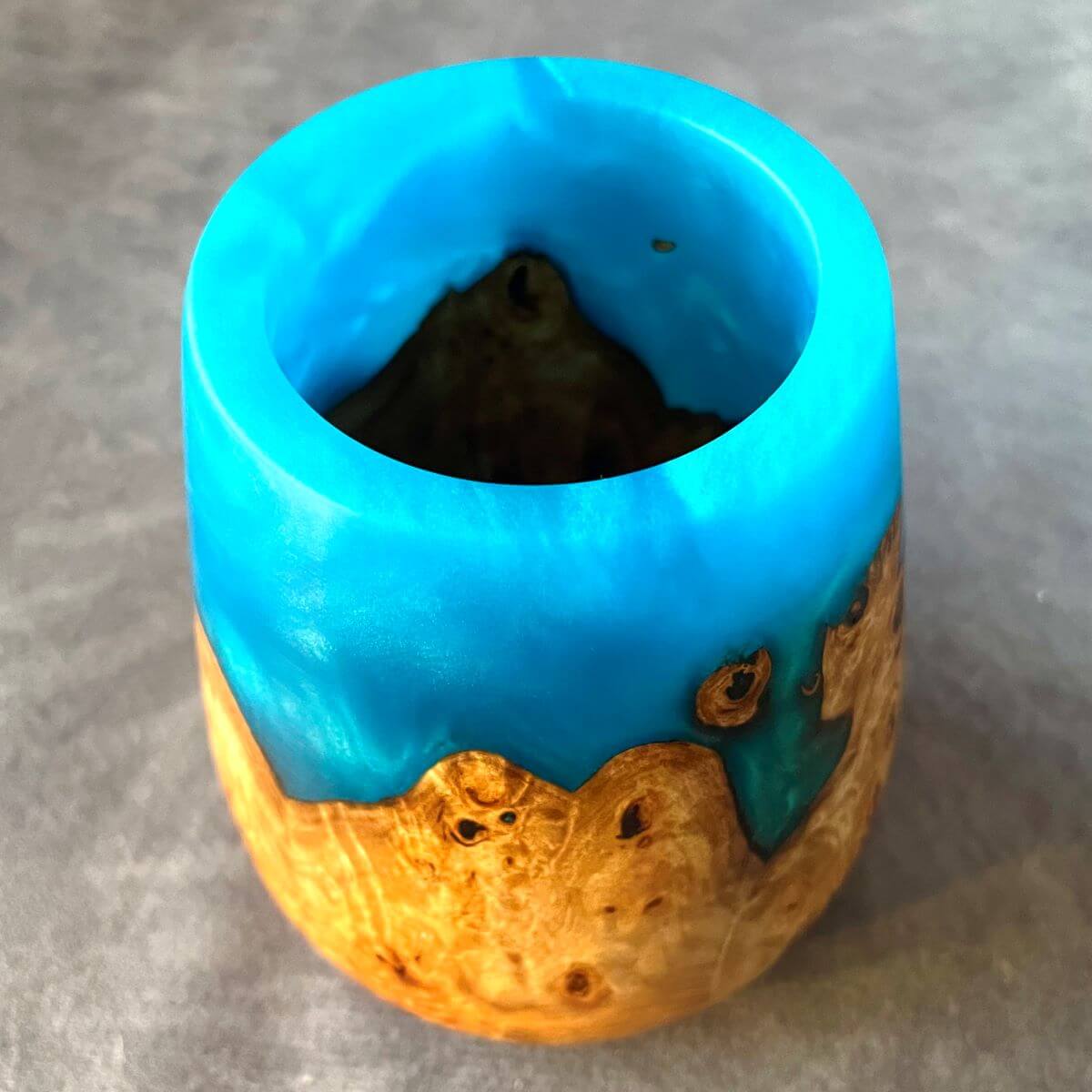 Handmade mappa burr and turquoise resin art vessel 90mm x 110mm front view made in Yorkshire.