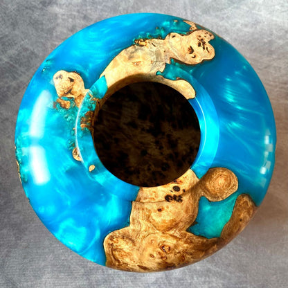 Detail of small opening on Mappa Burr hollow form showing turquoise resin depth